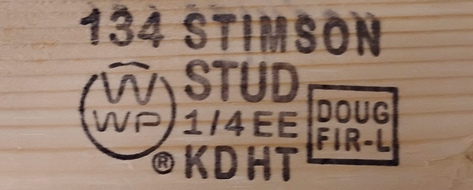 Close-up of a grade stamp reading 134 Stimson, Stud, Doug Fir-L, on a softwood board.