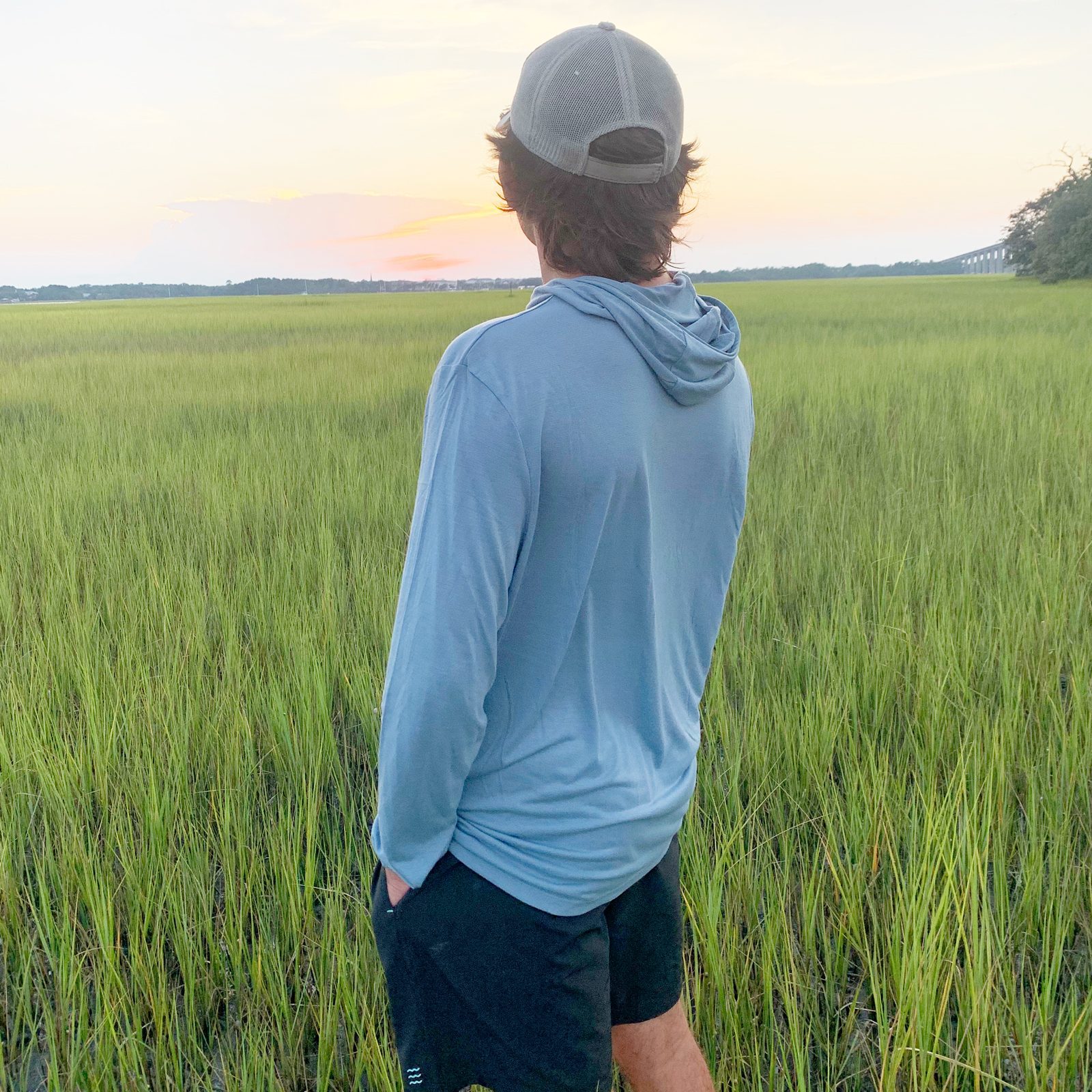 man wearing a Bamboo Lightweight Hoodie Free Fly