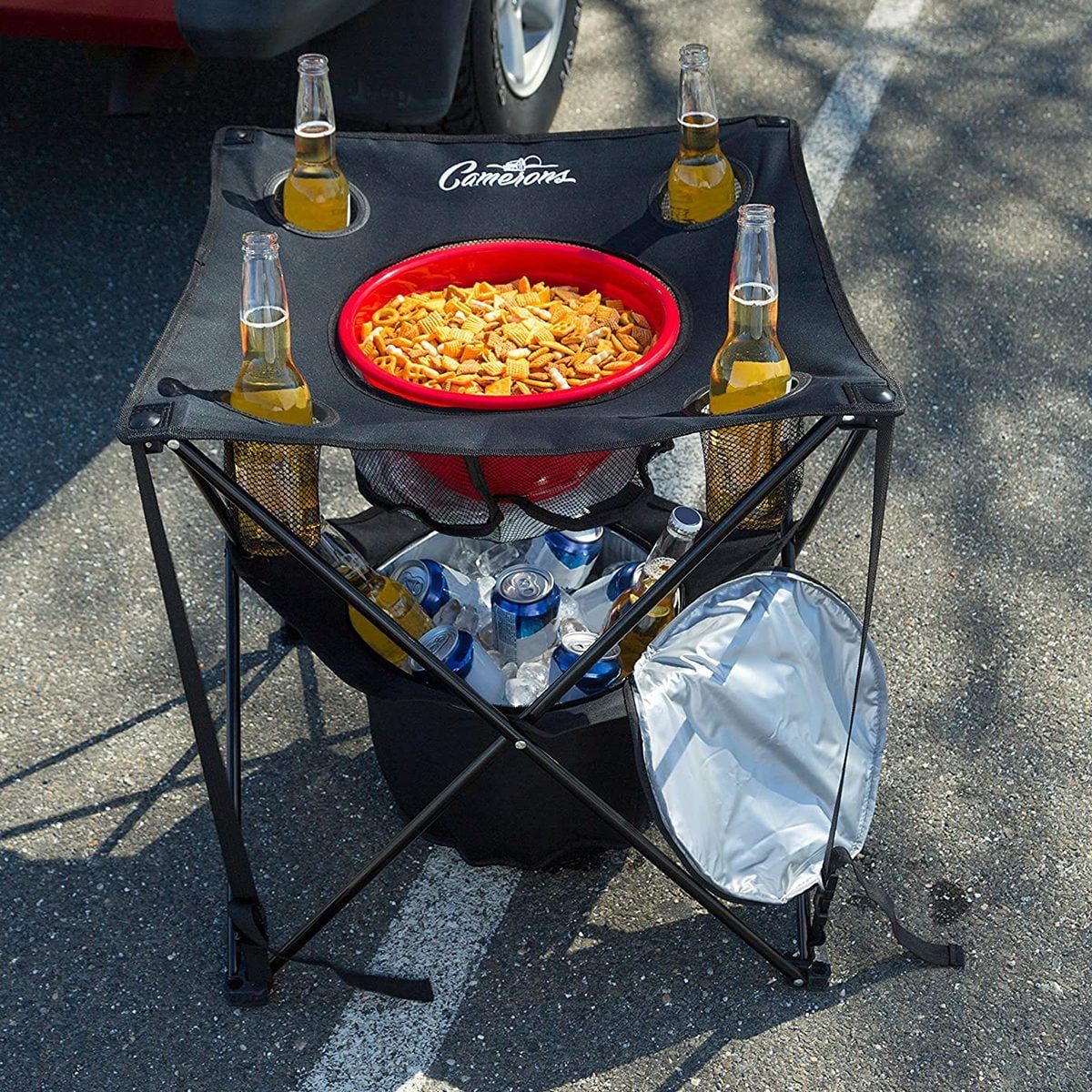 This Clever Tailgate Table Has an Insulated Cooler and Spots for Drinks and Snacks