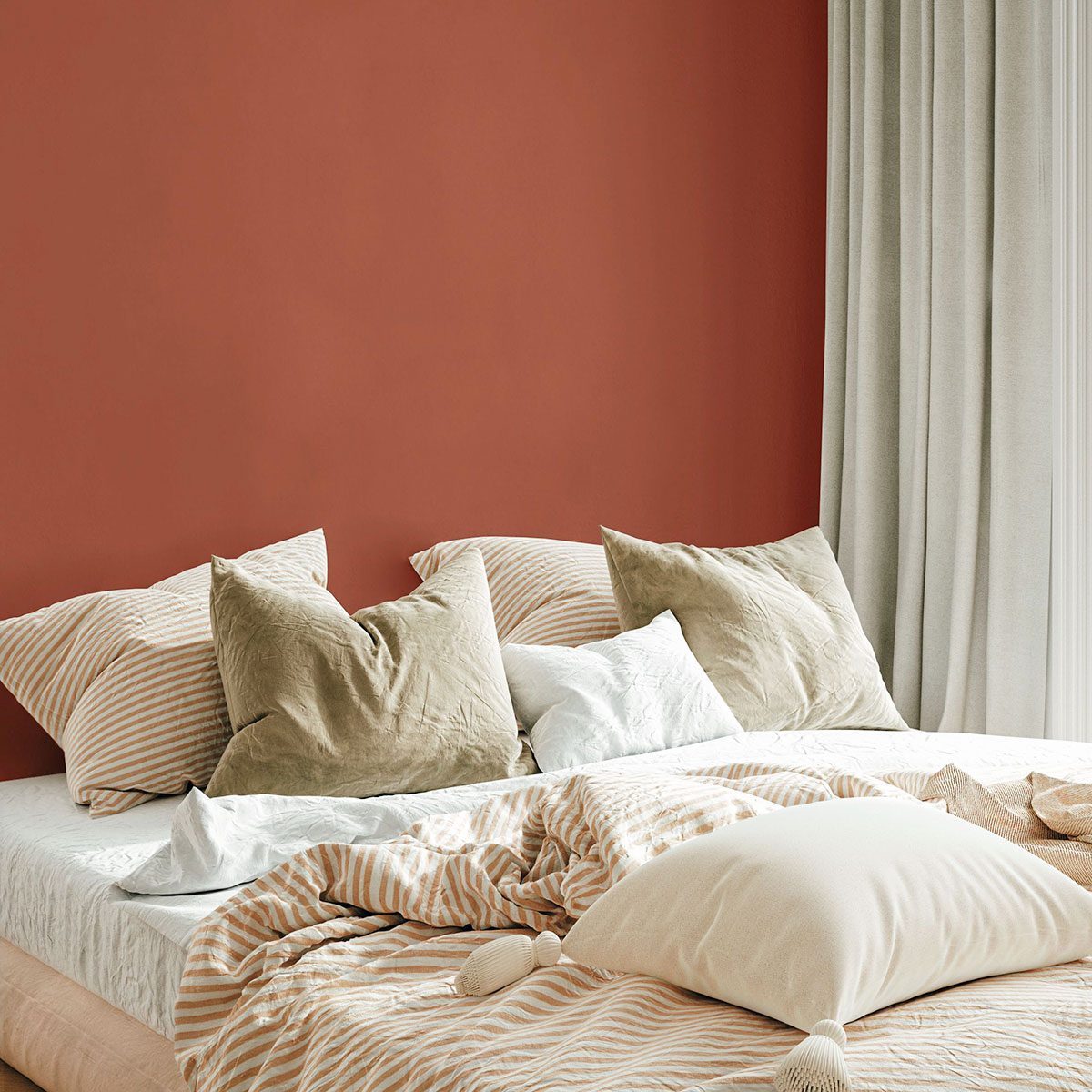 Bedroom's closeup with Clark + Kensington’s 2026 Color Of The Year paint on wall