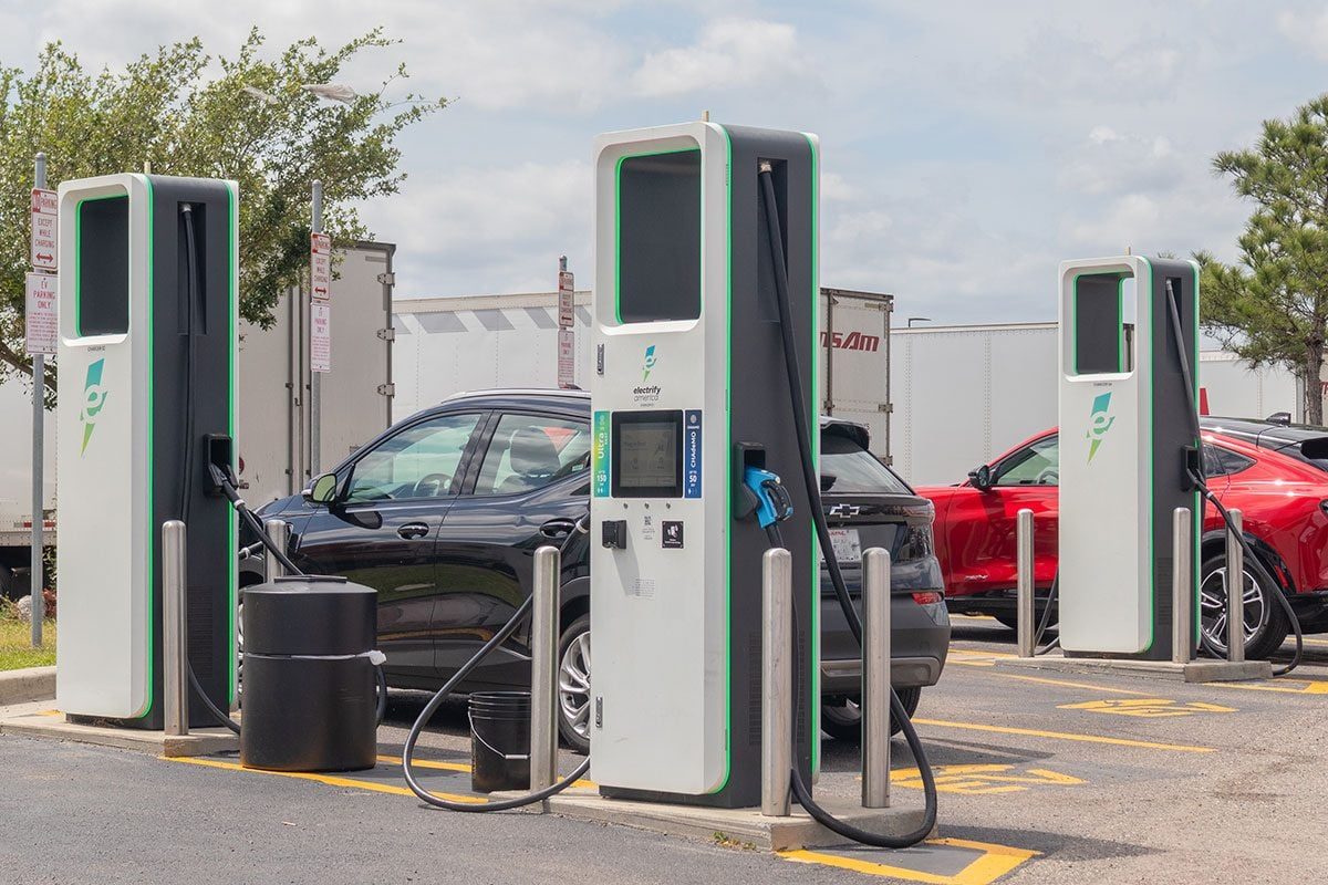 Electrify America electric vehicle charging station with multiple chargers in use