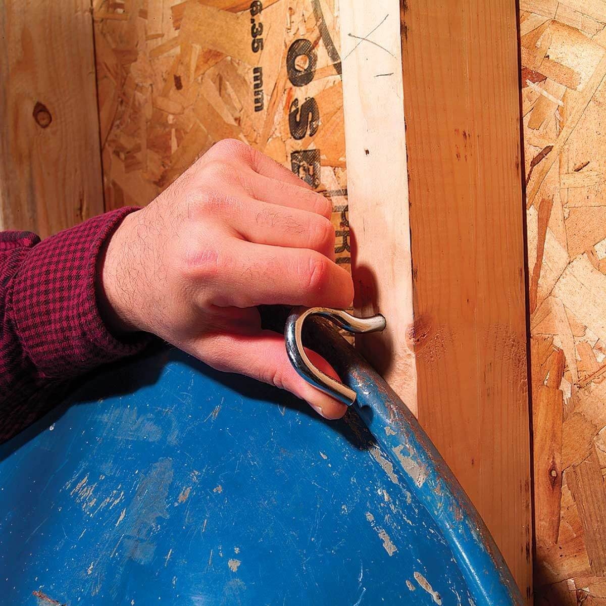 Keep Your Wheelbarrow in Track with this DIY Rack