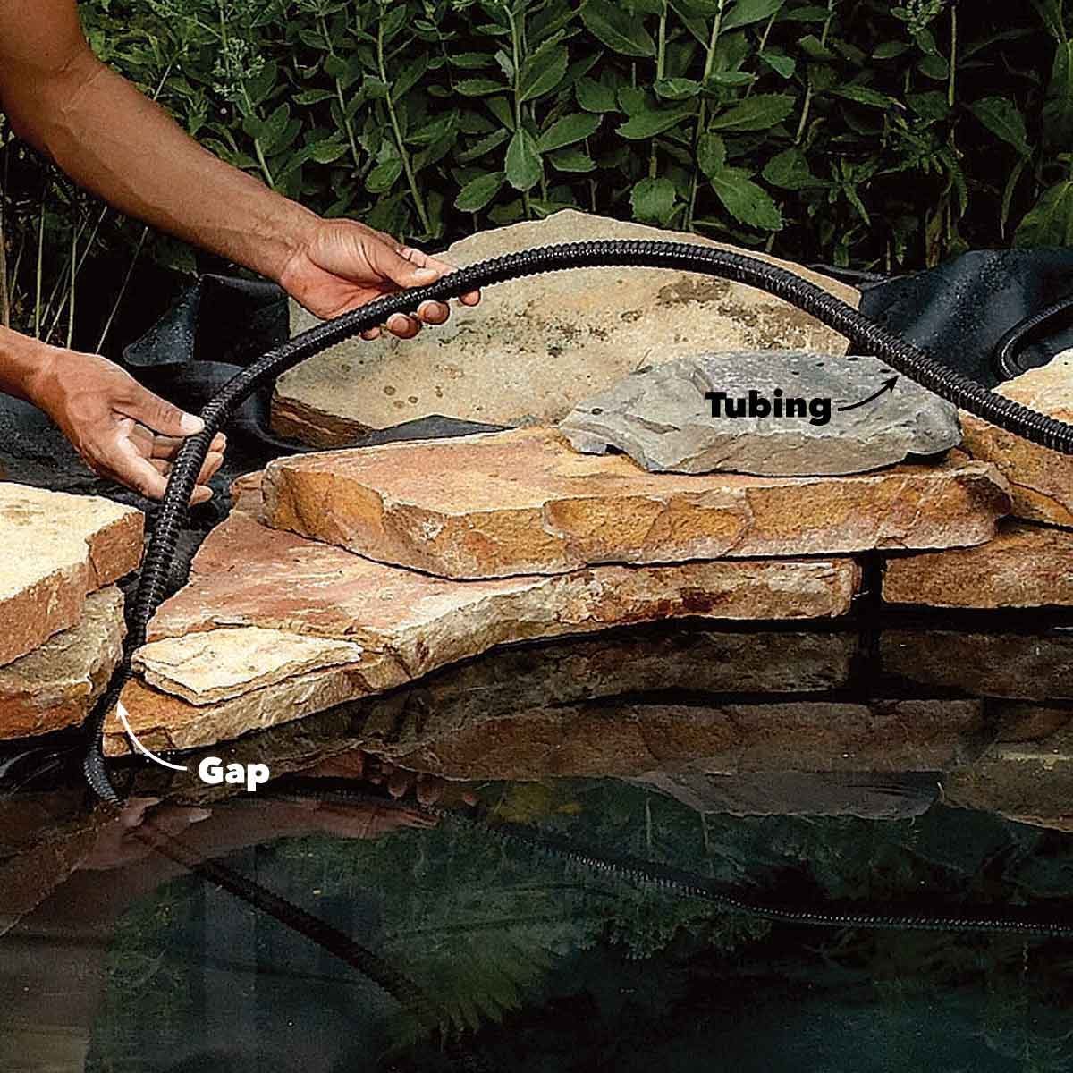 backyard fish pond plumbing tube