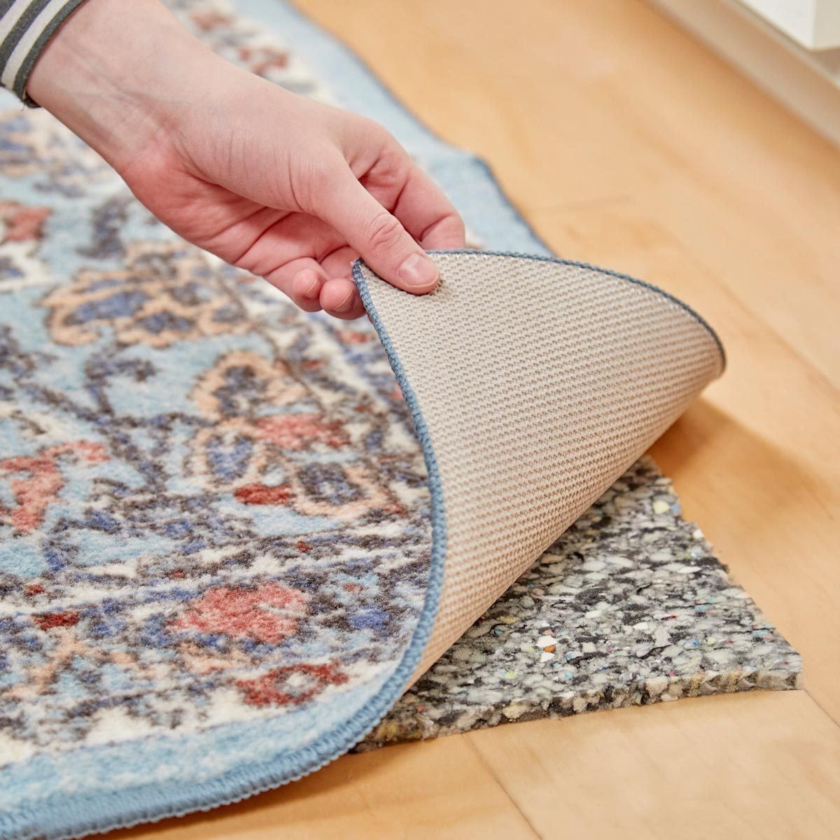 Want to Make a Rug More Comfortable for Standing? Check Out This Genius Hack
