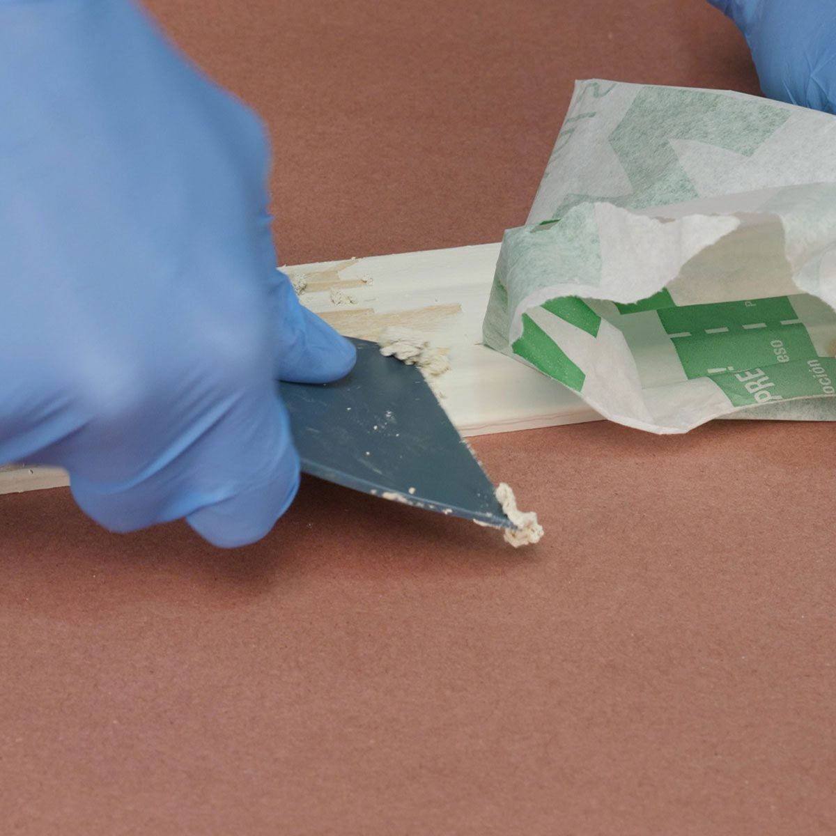 scrape off paint