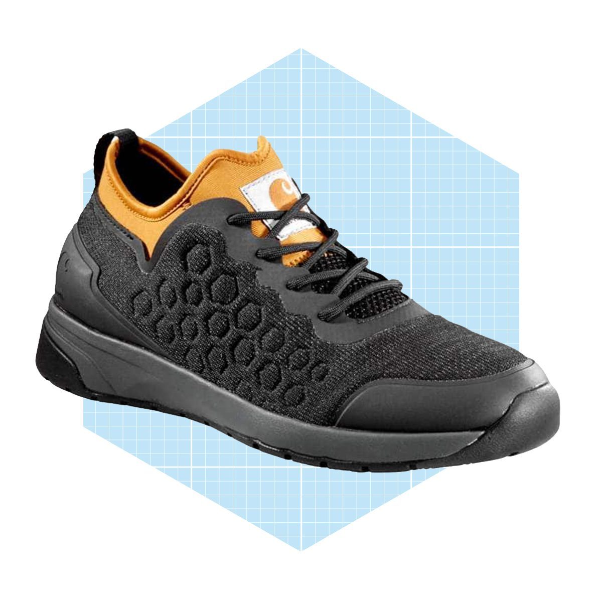 A black and orange shoe with a textured honeycomb design rests at an angle against a light blue geometric background.