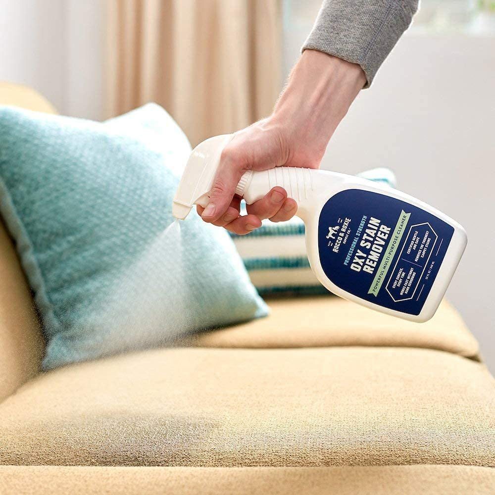 using Rocco & Roxie Oxy Stain Remover on a couch