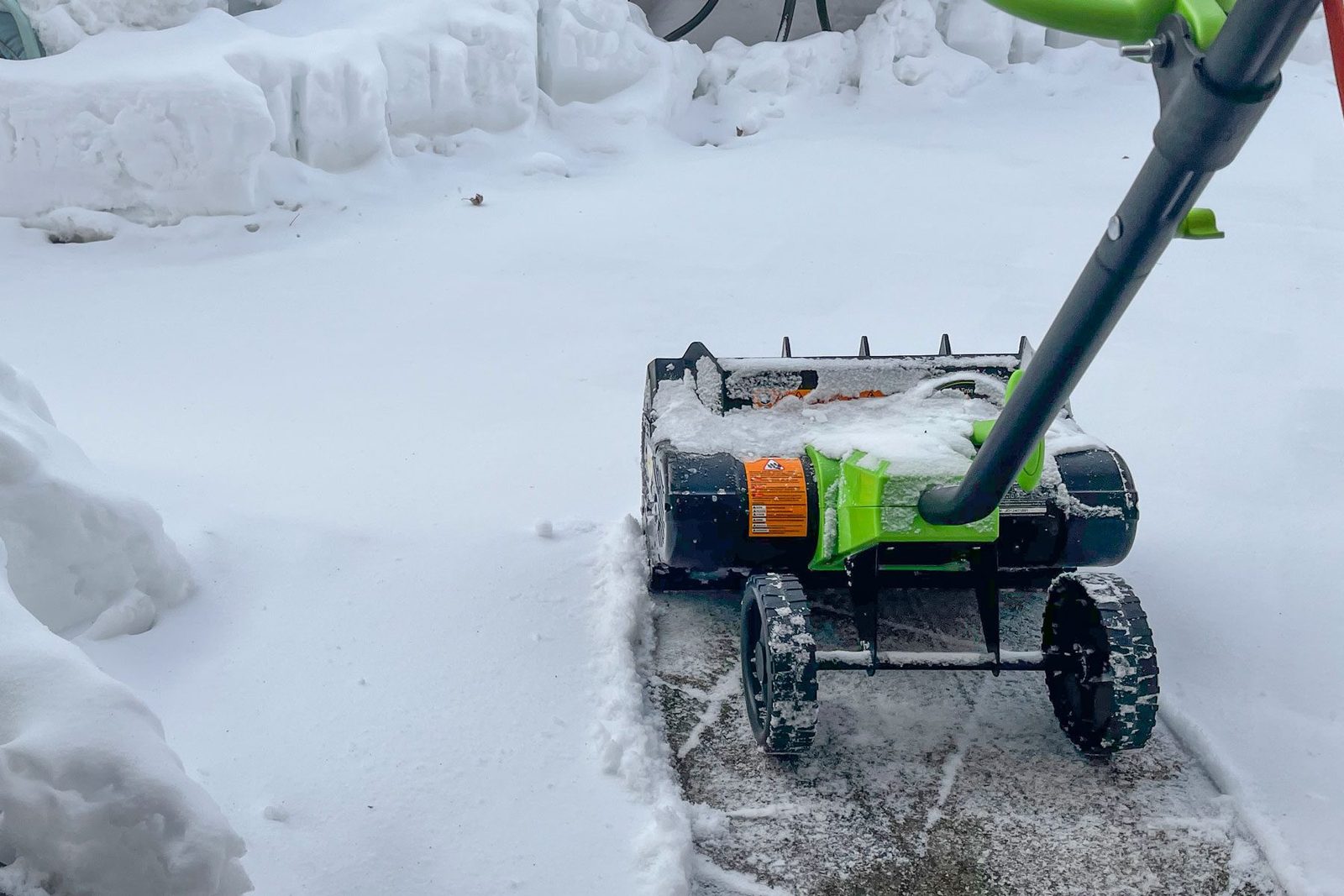 Earthwise Electric Snow Shovel cleaning the path way