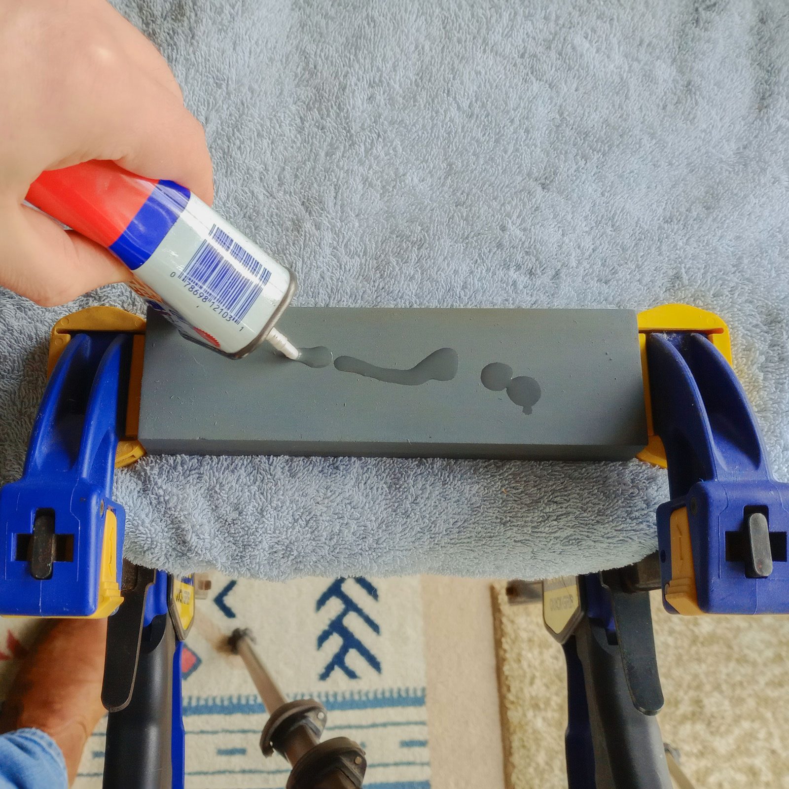 Applying household oil on whetstone