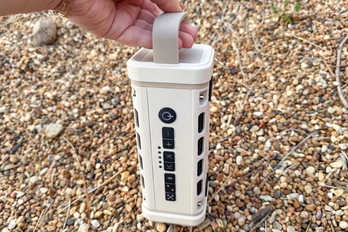 hand holding a Turtlebox Ranger speaker