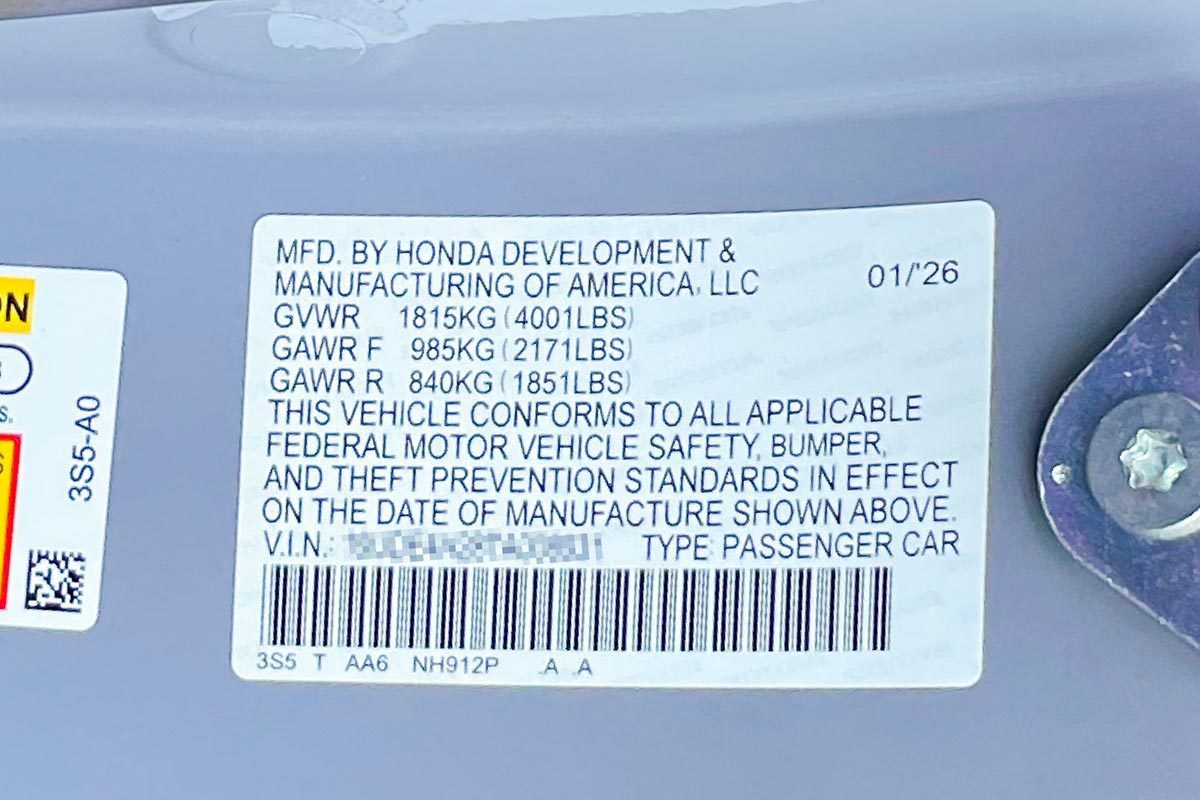Your Car Door Sticker Decoded: What All That Info Actually Means