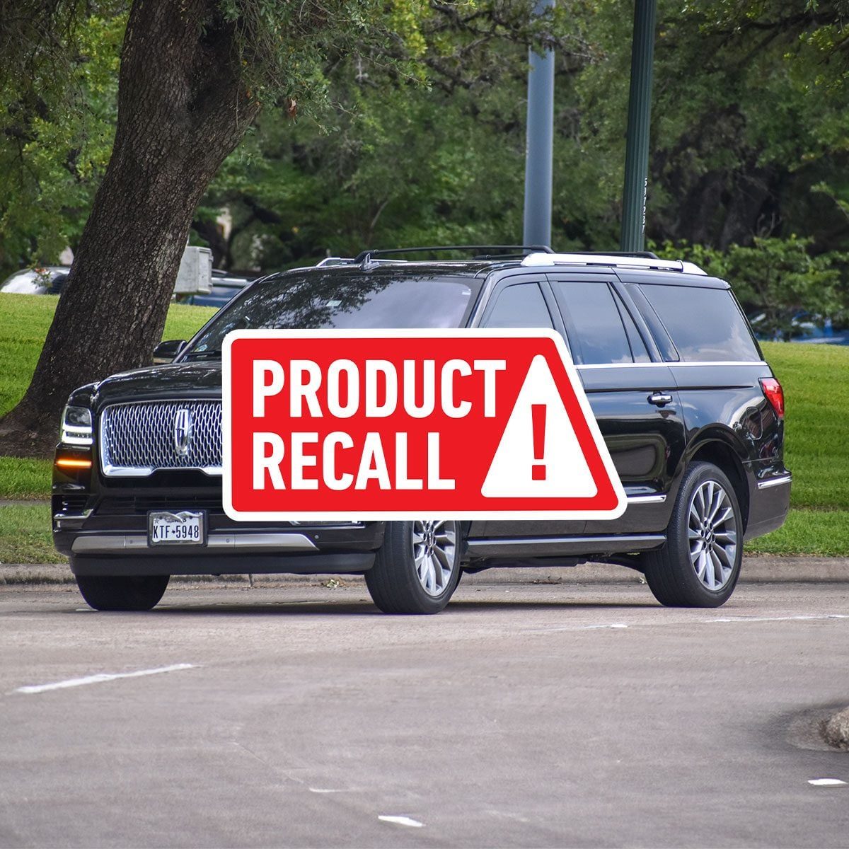 Ford Lincoln Navigators with Product Recall badge in the foreground
