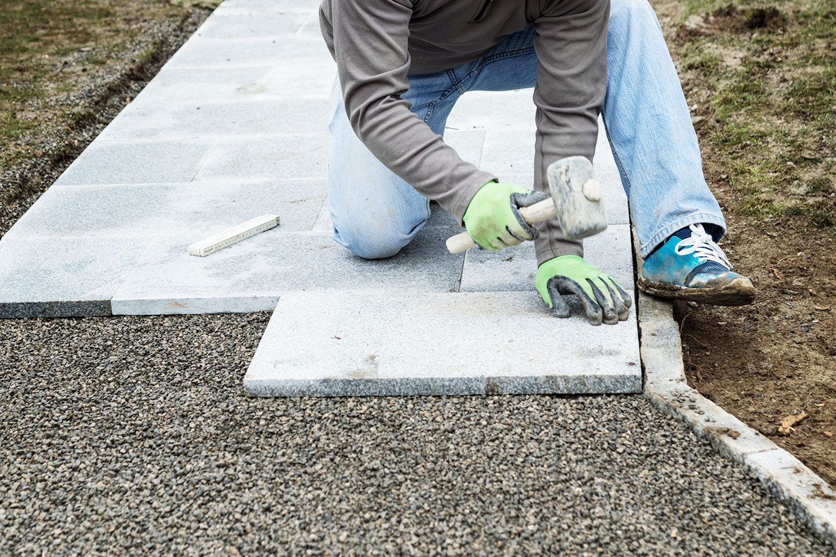 If You're Laying Landscape Pavers, You Need This Easy Trick
