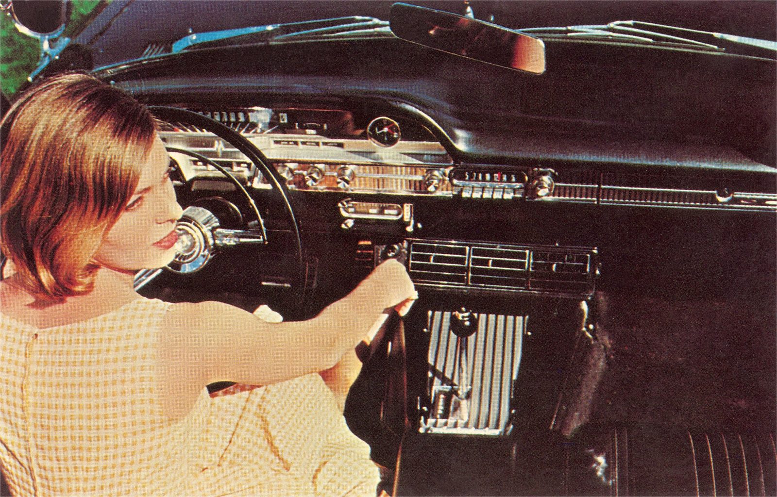 High angle view of woman Inside '50s Car holding the gear shift