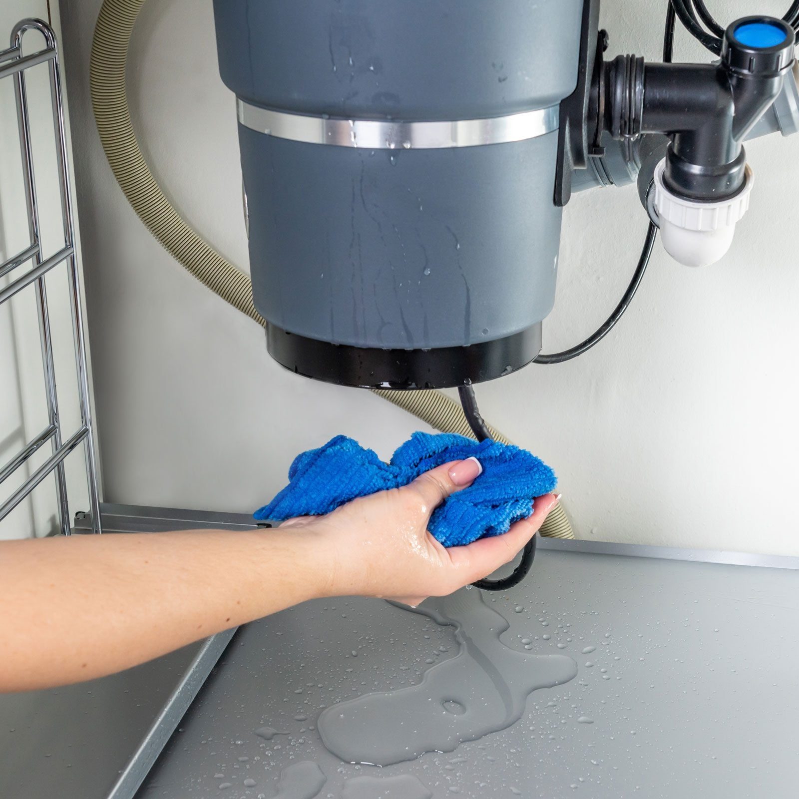 leaking garbage disposal under the sink