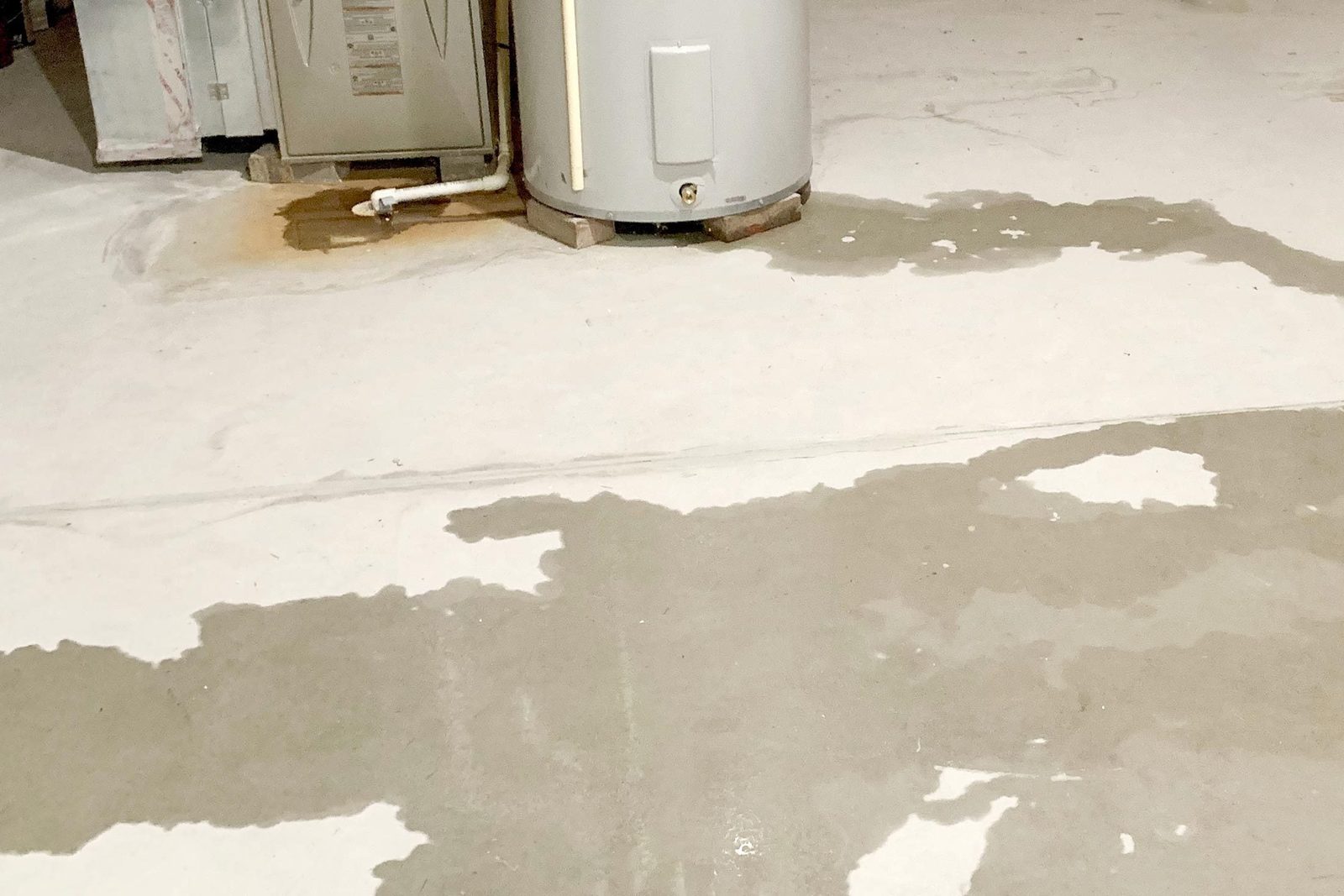 Water leak on basement floor from furnace