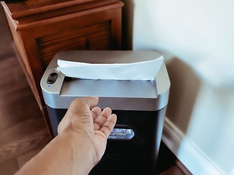 Woman Shreds Documents