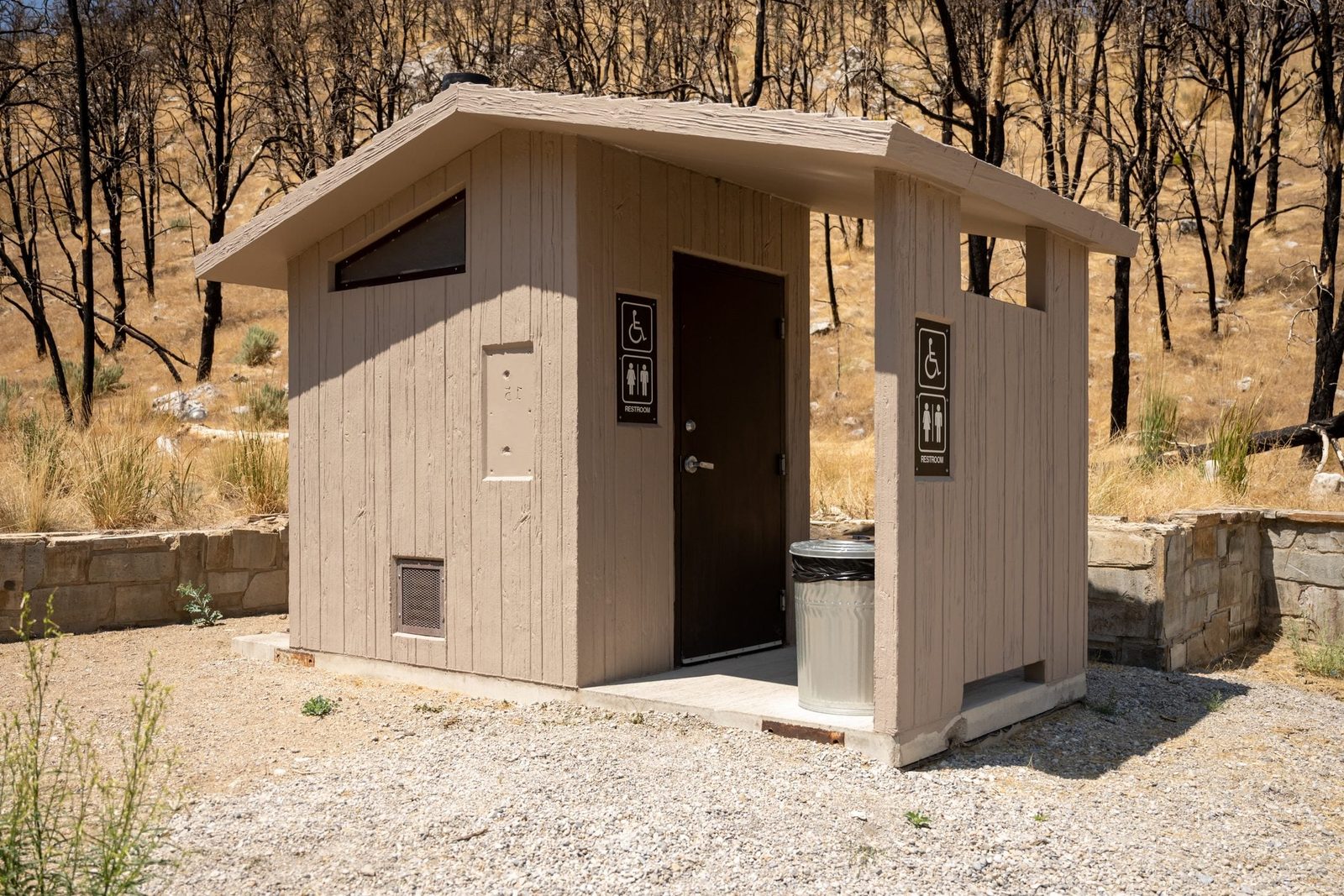 Pit Toilet Stands at the Base of a Charred Forest in Great Basin National Park
