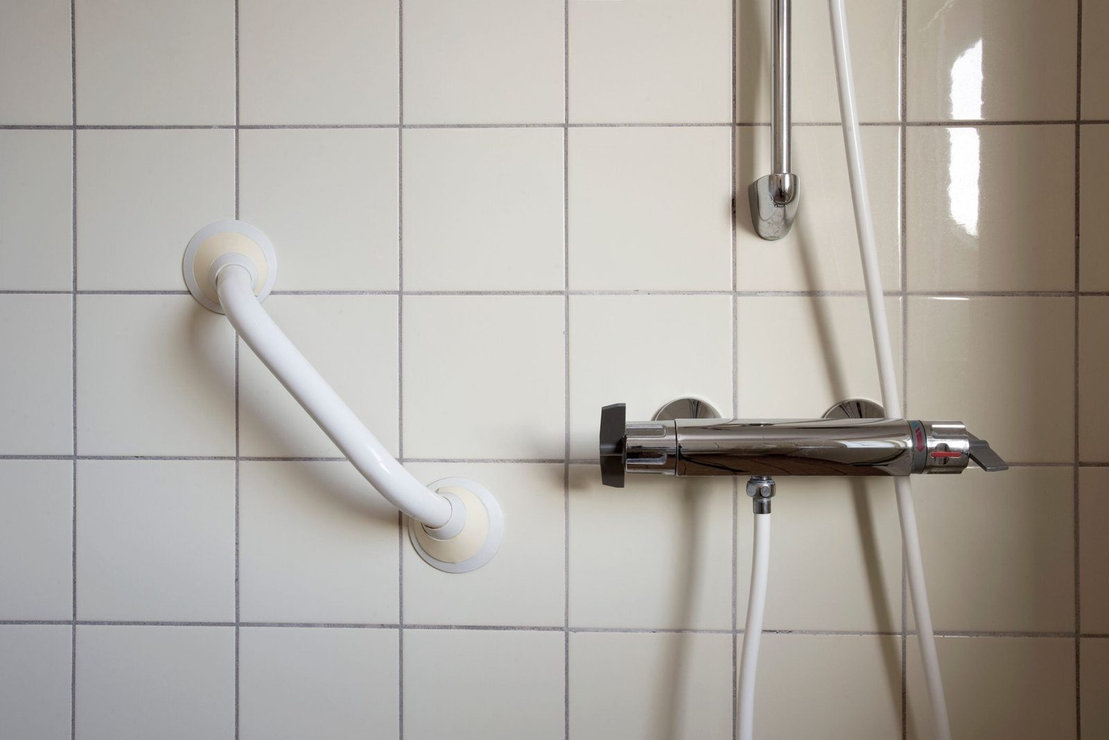 Shower and handrail,grab bar for elderly people at the bathroom in hospital or retirement home , safty and medical concept