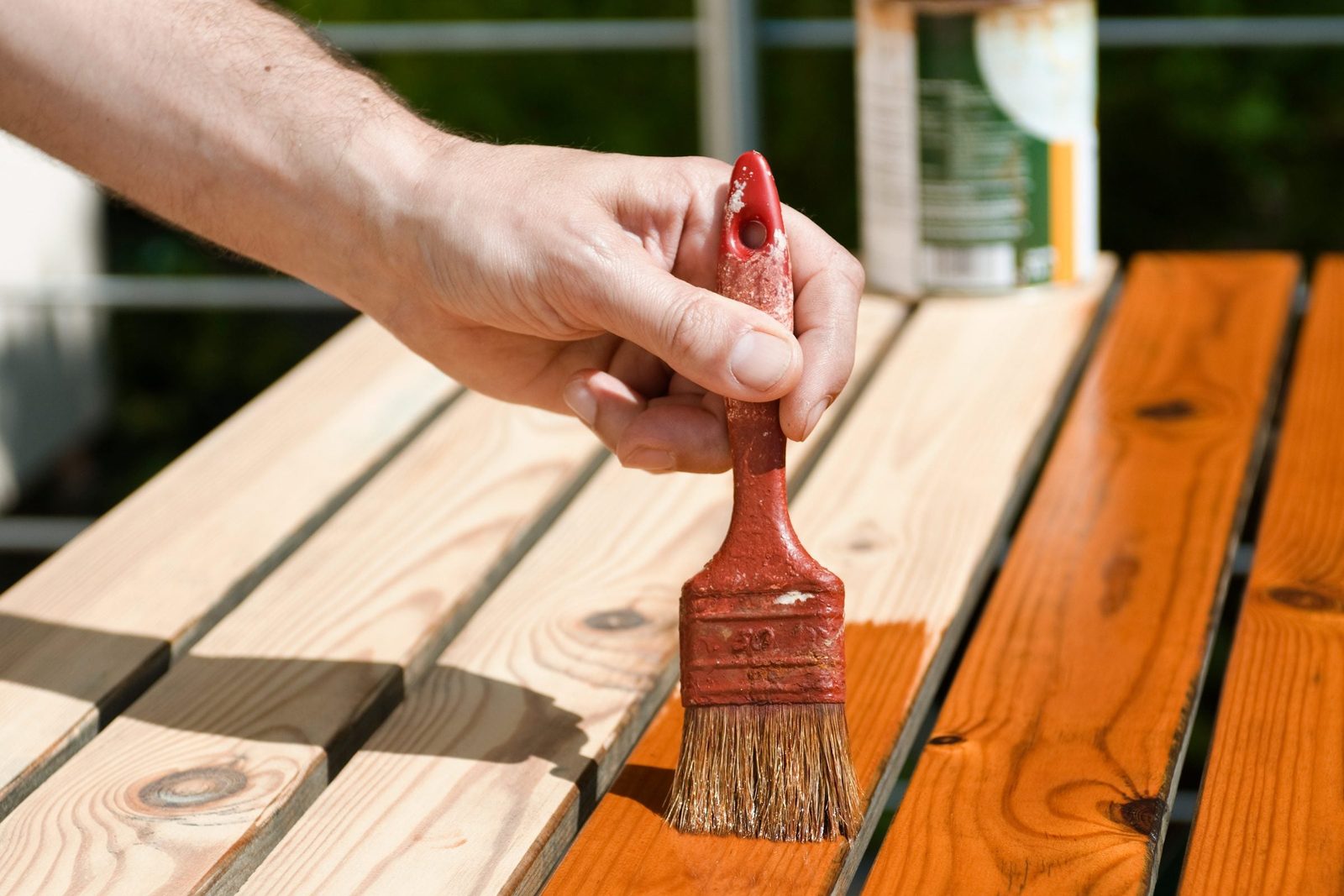 applying stain to maple wood