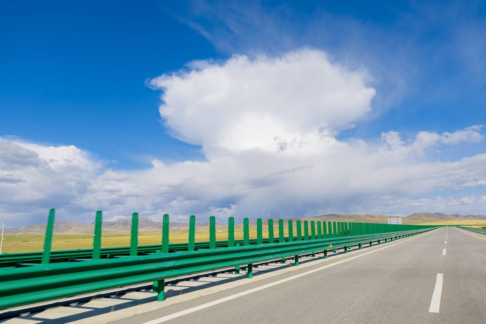 Empty road against sky