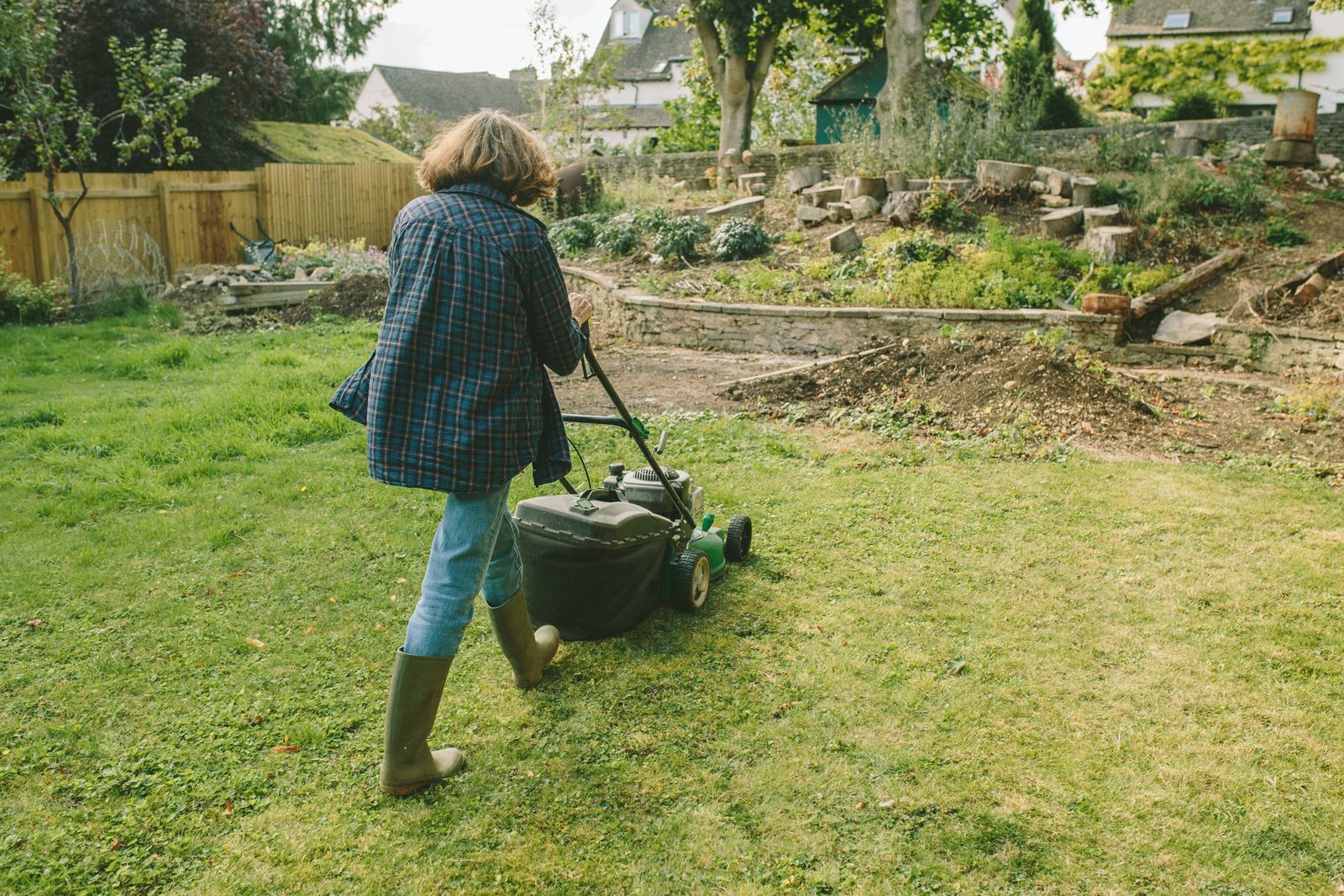When Are You Too Old to Mow Your Own Lawn? Experts Weigh In