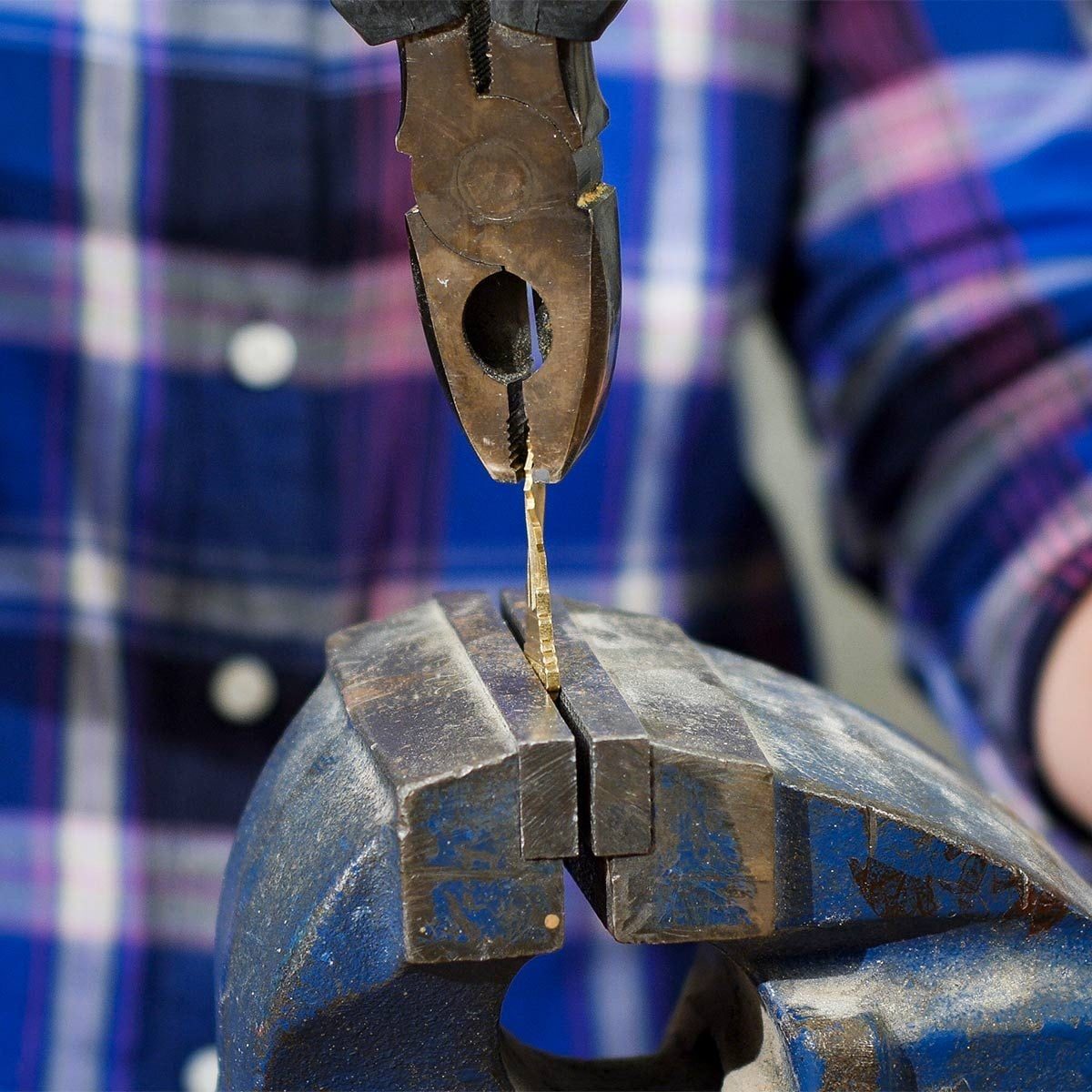 use pliers to fix a twisted key