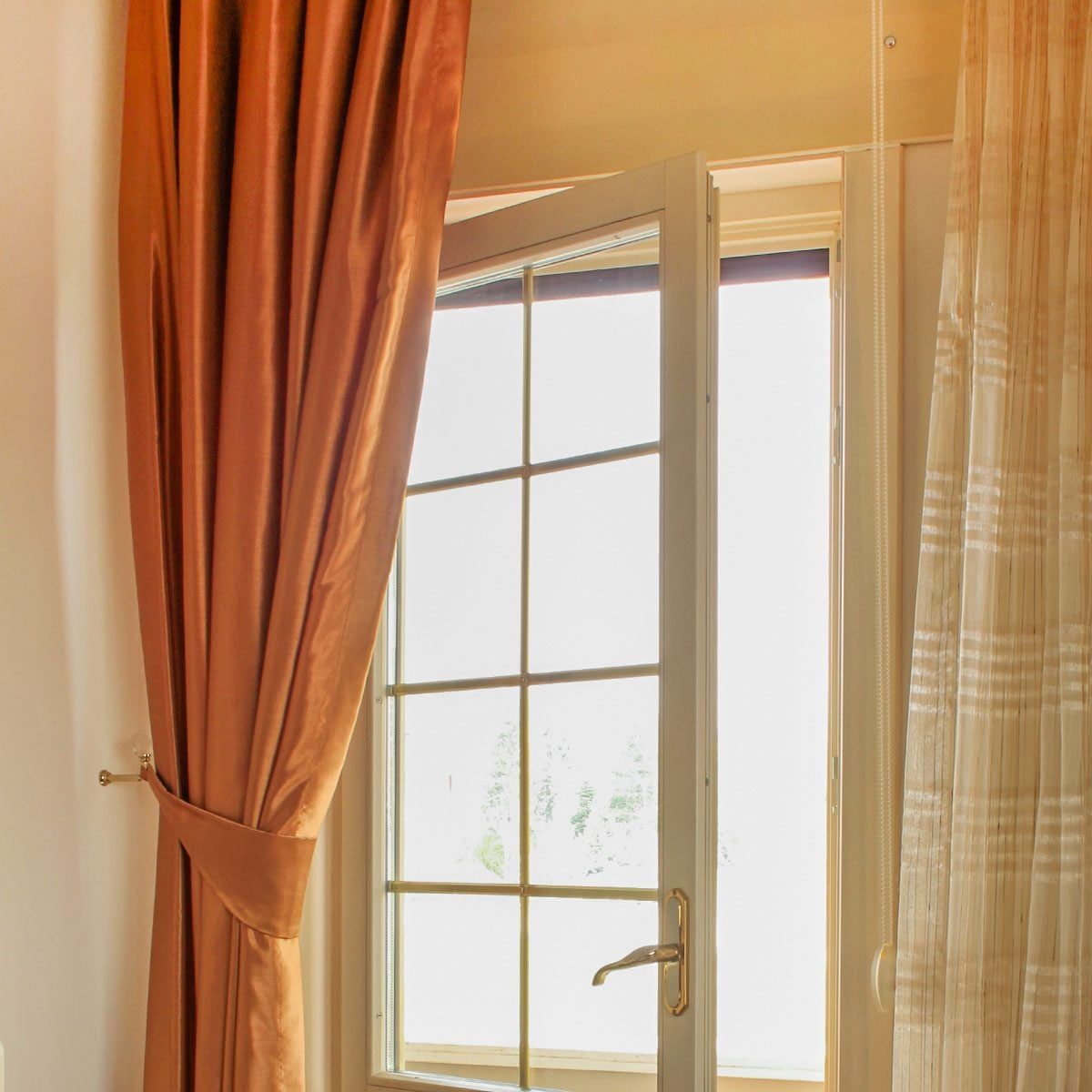 If You See a Curtain Over a Door, Here's What It Means