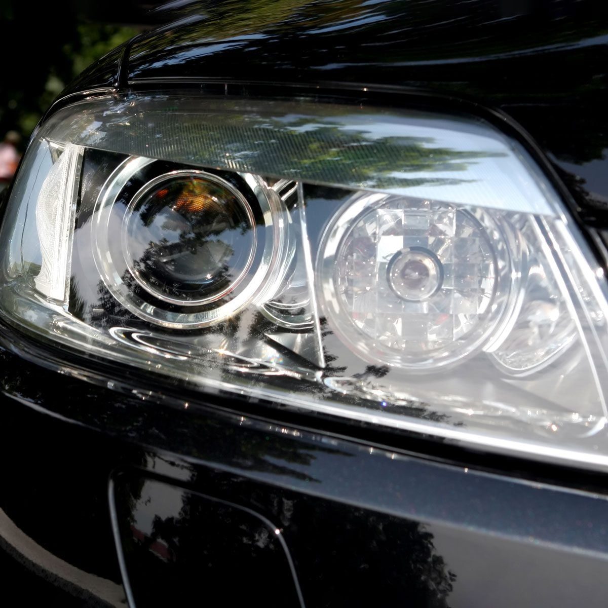 Led Vs. Halogen Headlights of Black Car