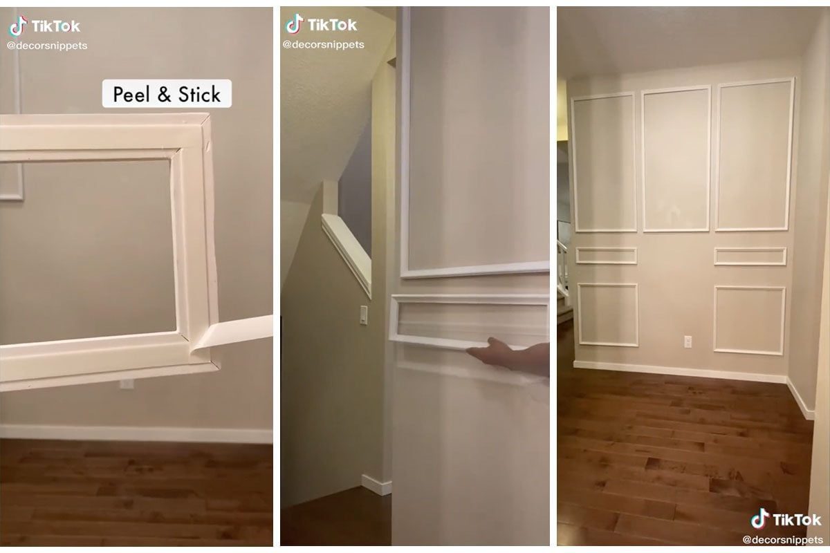 White decorative trim is being applied to a wall, enhancing the interior space with a clean, modern look against a beige background.