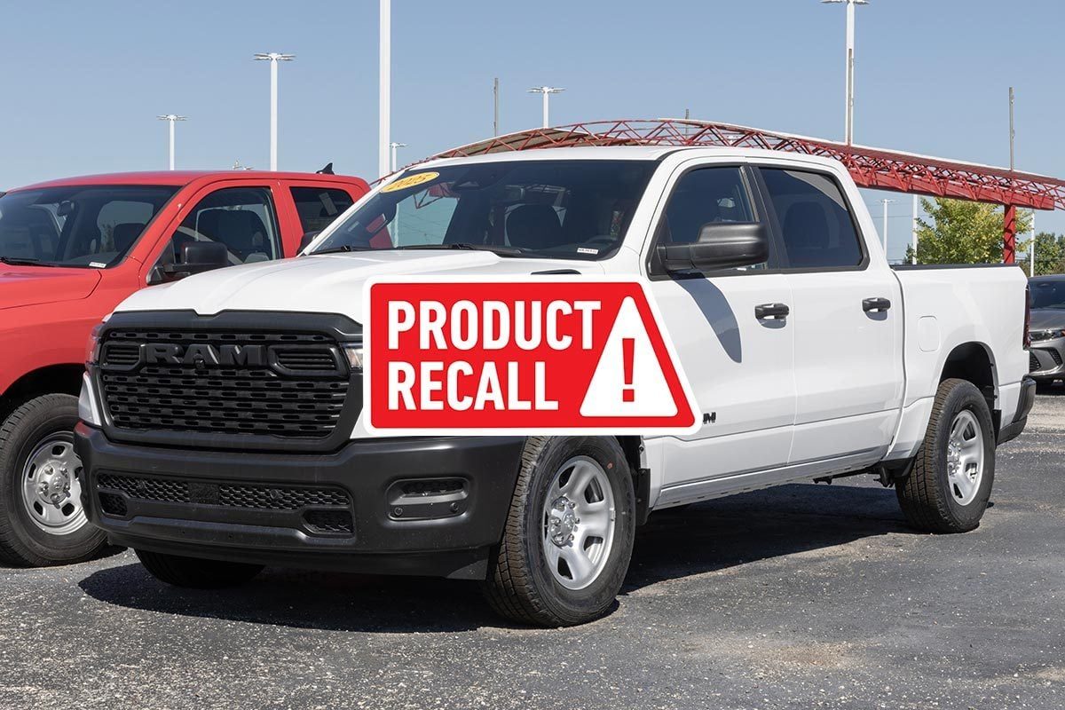 White 2025 Chrysler RAM 1500 with a red "product recall" sticker overlaid