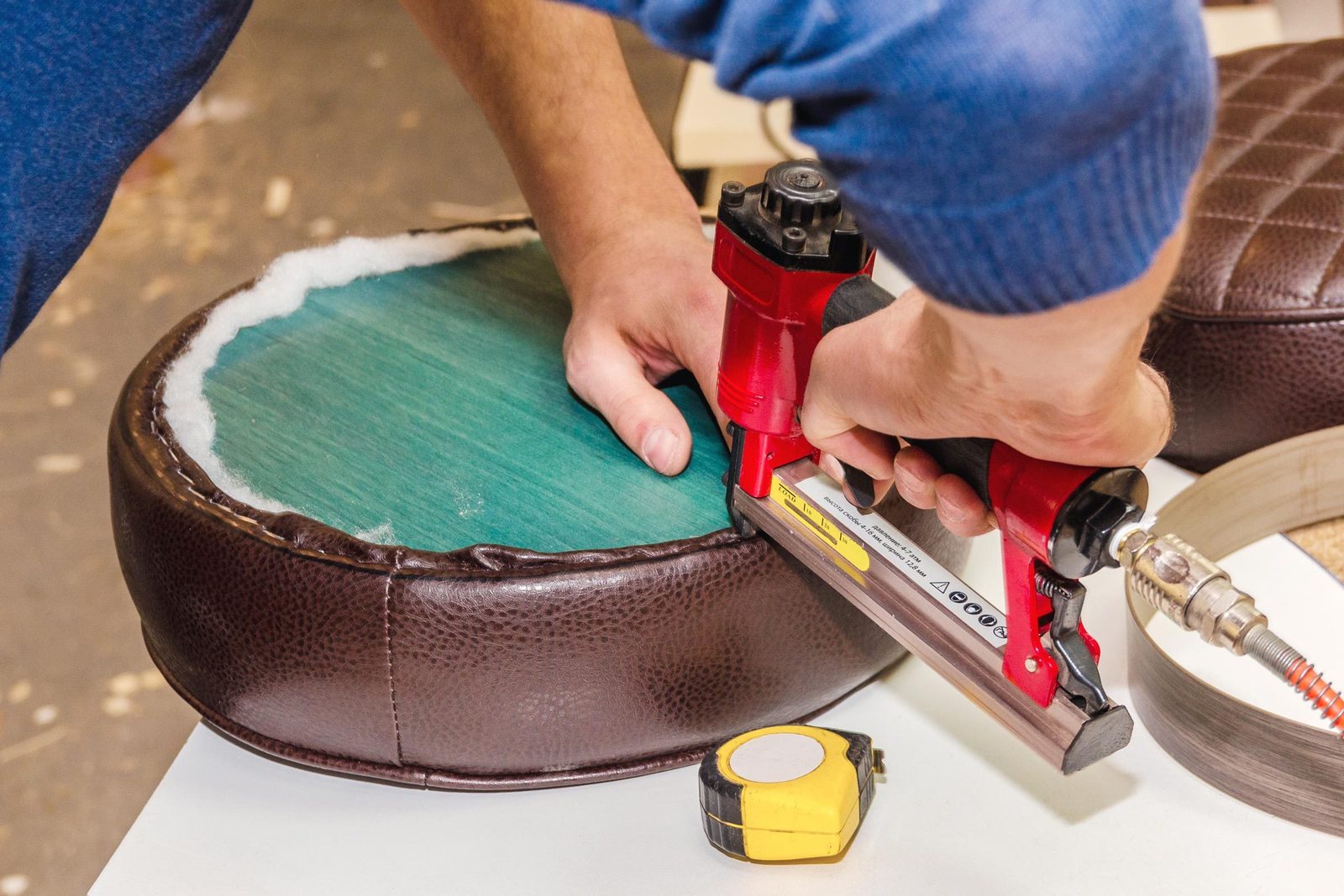 stapling leather to a bar stool