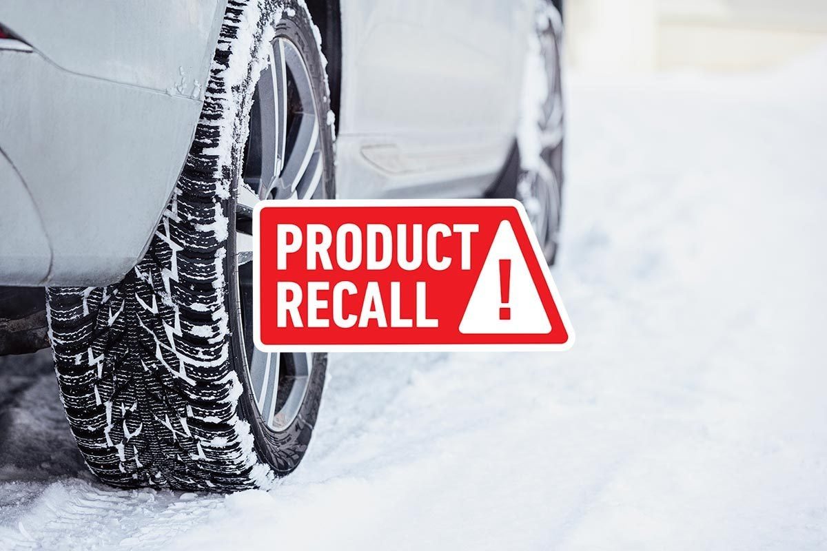 A car's tire in the snow