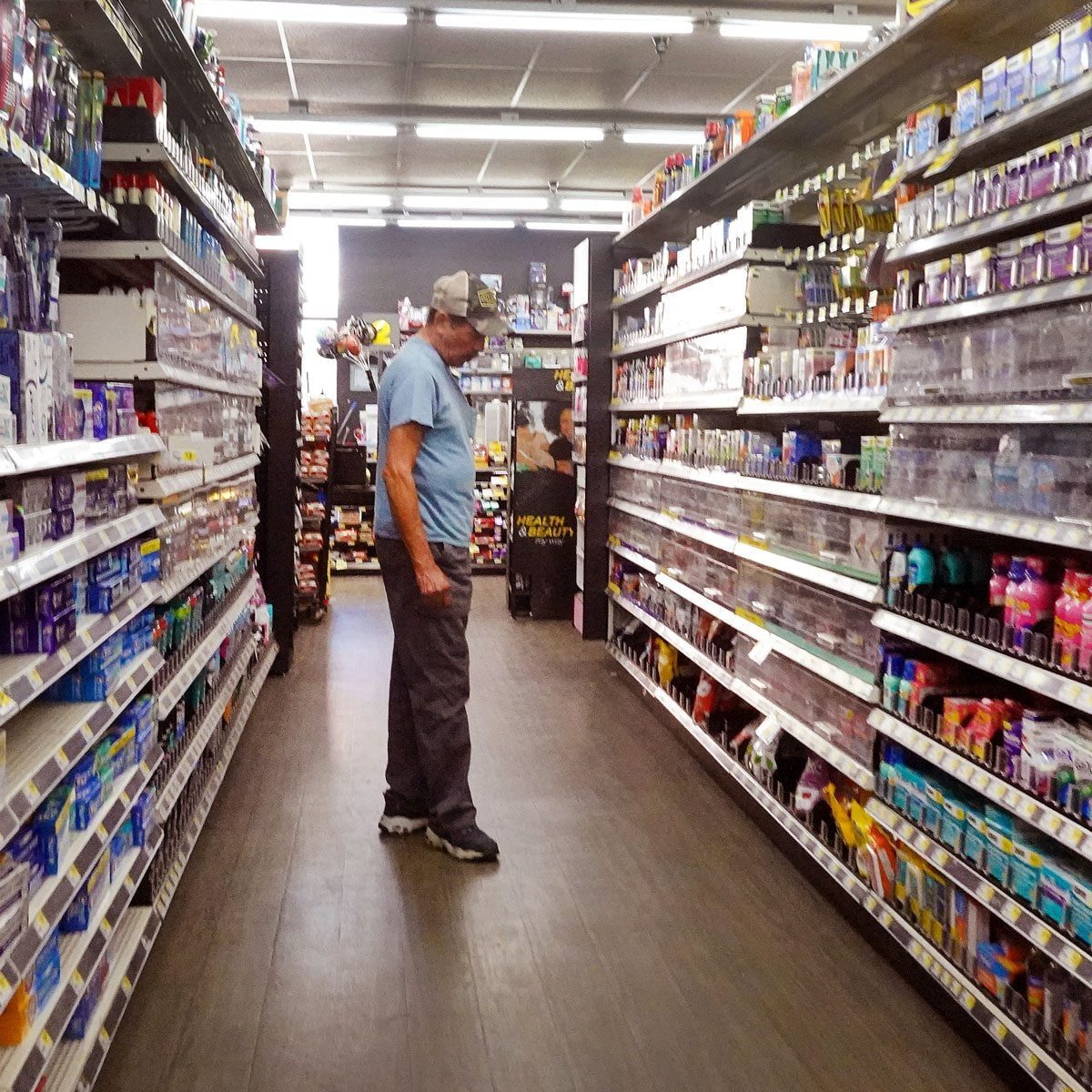 A customer shops at a Dollar General store