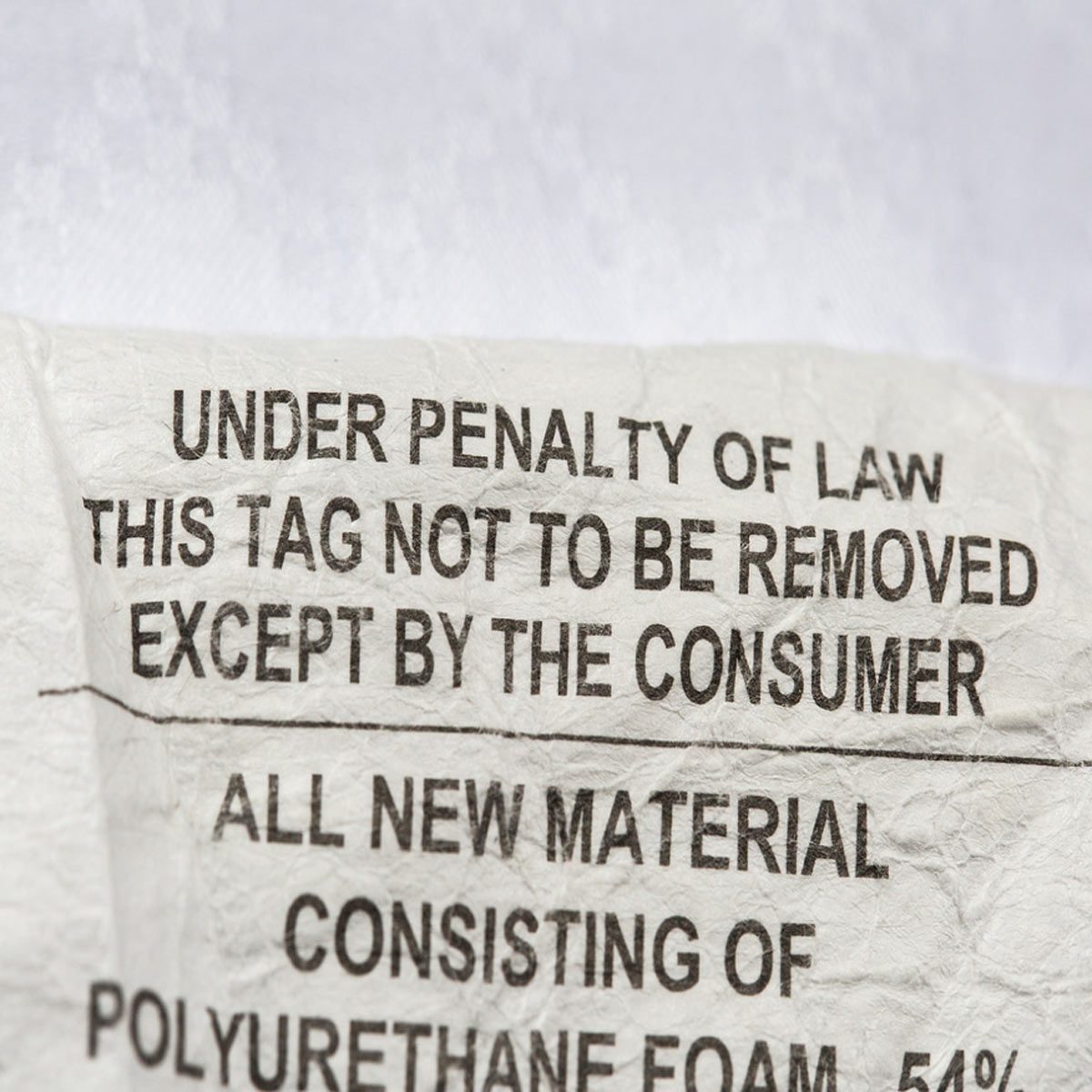 This Is Why It's Illegal to Remove a Mattress Tag