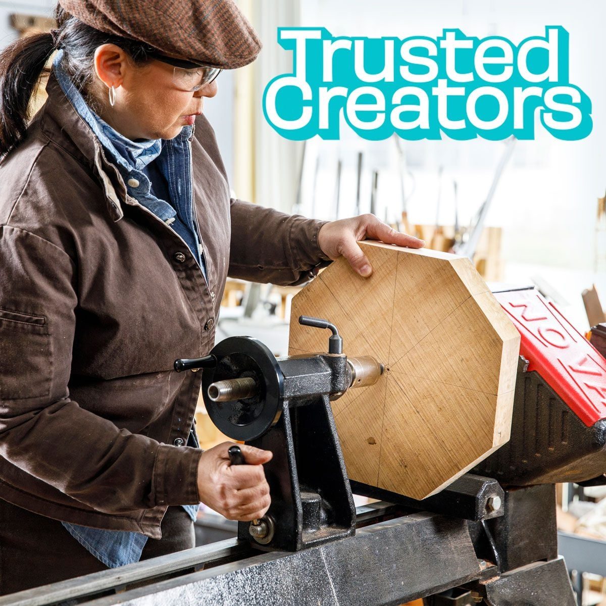 A woman in a woodshop working on a lathe. on the image is the Trusted Creators logo.
