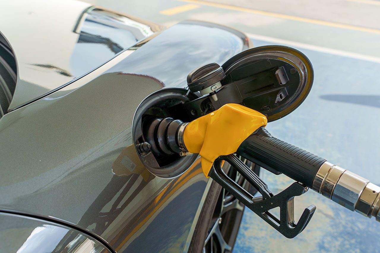 Close-up shot of a sports car refueling