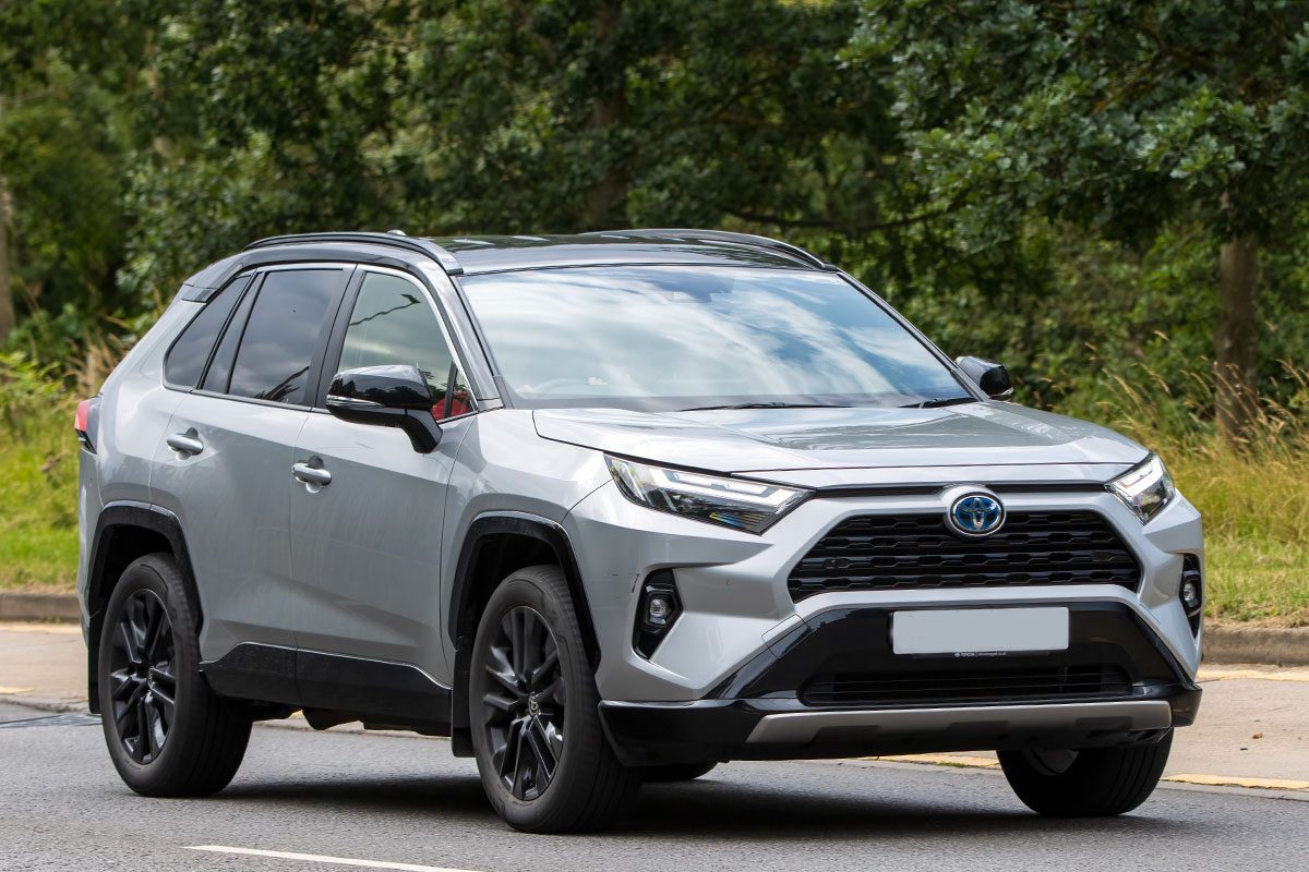 TOYOTA RAV4 car driving on an English roa