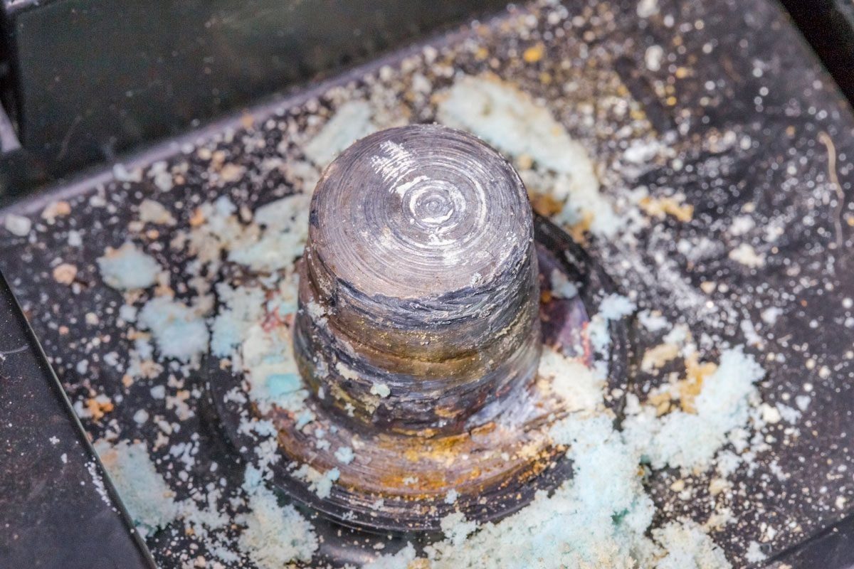 Car battery terminal with corrosion on lead post