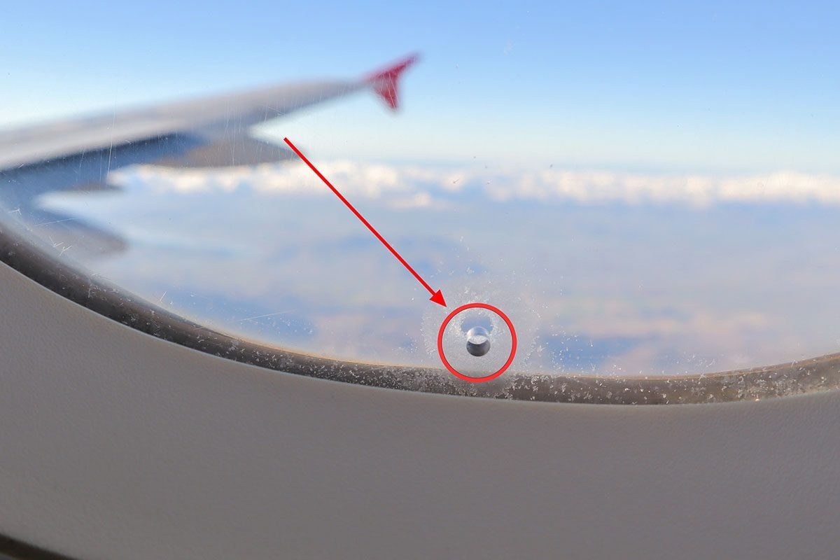 Hole in the airplane window