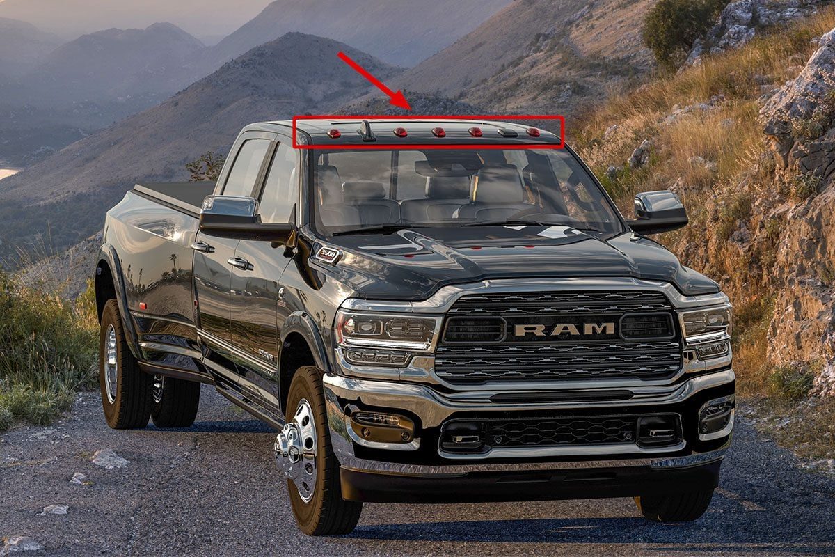Dodge Ram 2500 on a mountain road with indication of Amber Lights on Top