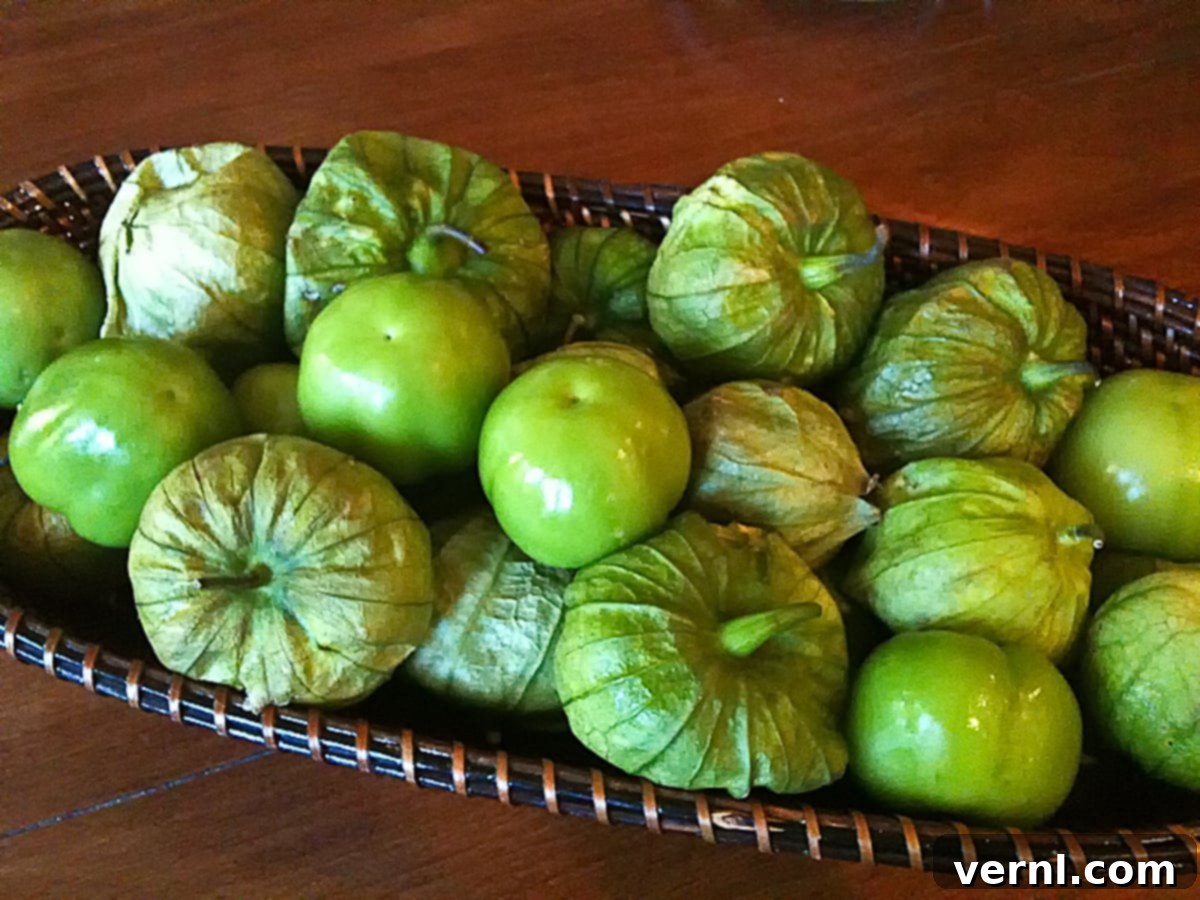 tomatillo- Basket of green tomatillos.