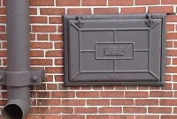 The Curious Purpose of Tiny Iron Basement Doors in Old Houses