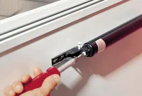 Understanding the Two Screw Holes on Your Storm Door Closer