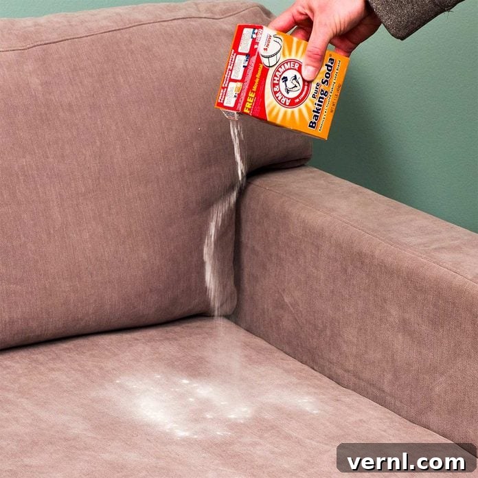Refresh Your Sofa with Baking Soda 2 pouring baking soda onto upholstery