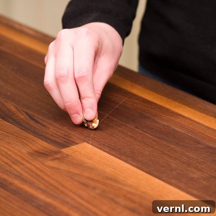 Walnuts: The Natural Wood Scratch Solution 3 Walnut oil treatment making wood scratches disappear