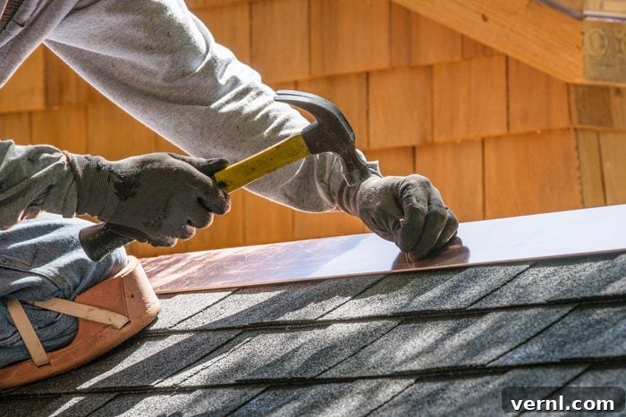 Flashing Explained: Common Types and How They Function 3 Hands can be seen nailing aluminium flashing