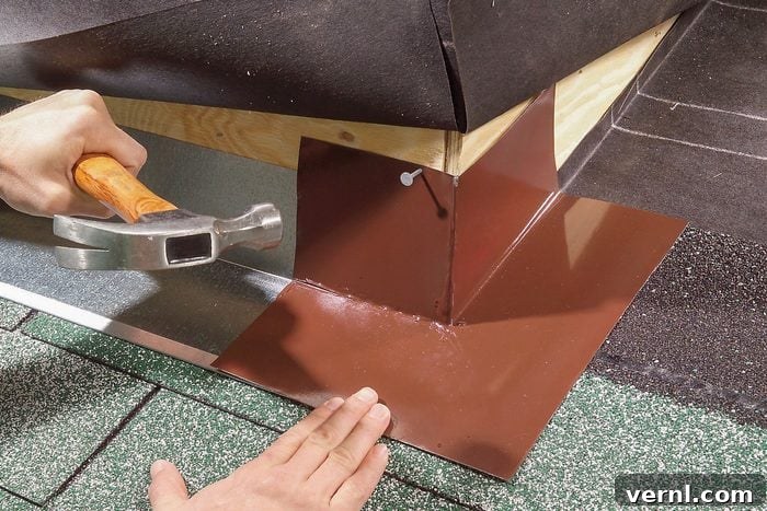 Flashing Explained: Common Types and How They Function 5 Hands can be seen nailing flashing on base flashing.