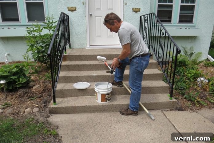 UGL NuDeck Concrete Solutions 9 Using a power mixer attachment on a cordless drill to thoroughly mix NuDECK coating.