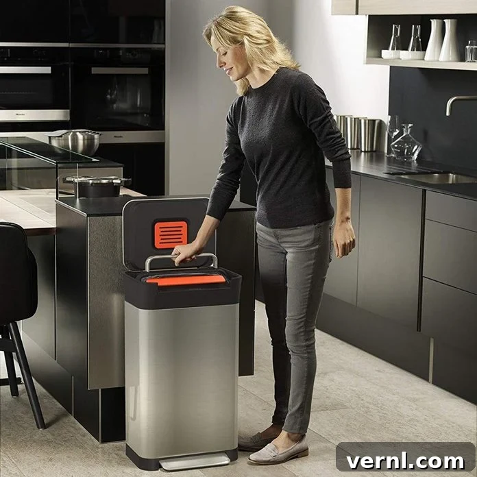 The Compactor Advantage: Your Guide to Smarter Waste 2 woman-activates-kitchen-trash-compactor